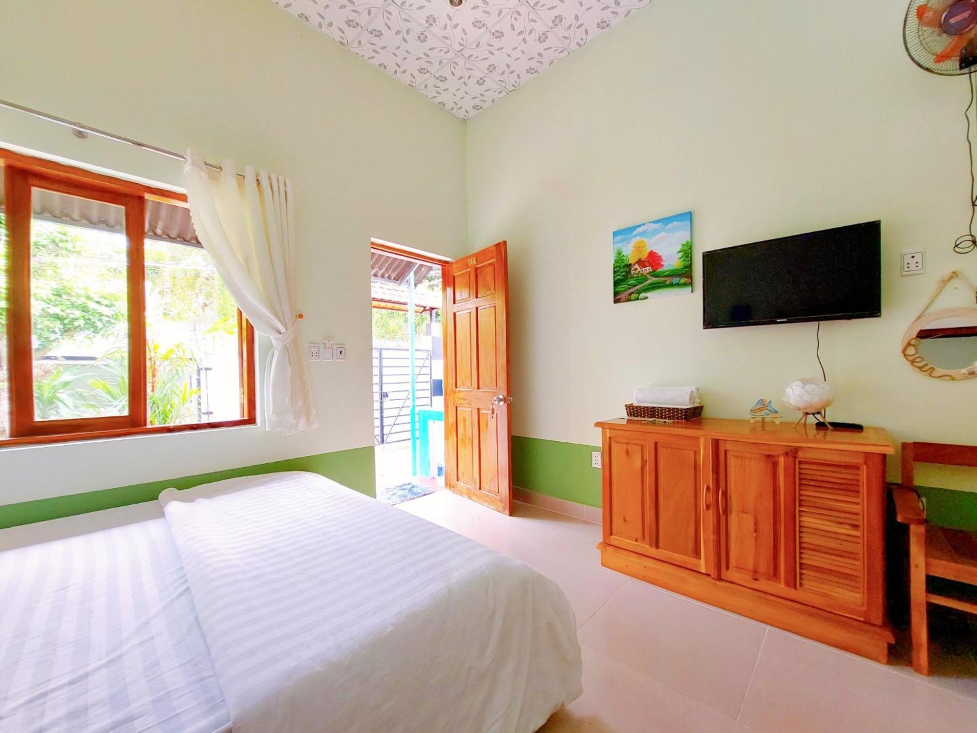 Ben Guesthouse Фукуок Номер фото